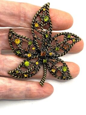 AVON Nina Ricci Rhinestone Accent Leaf Pin with Green & Amber Stones With Box